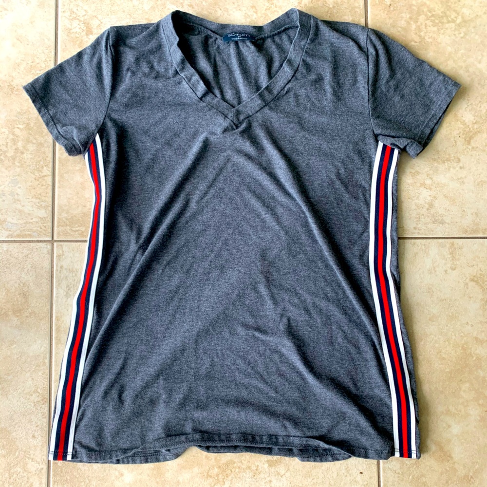 Scarlett grey top with red and white lines design.